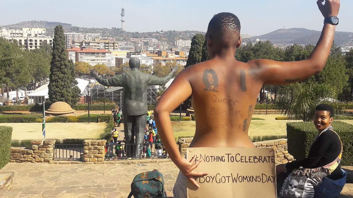 maseramaru's tweet photo. Happening now: Black womxn staging a naked protest outside of the union buildings. Because #BoycottWomxnsday https://t.co/v0zlF9HPkL