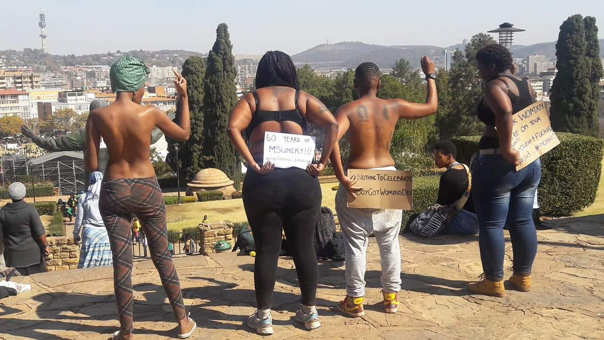 maseramaru's tweet photo. Happening now: Black womxn staging a naked protest outside of the union buildings. Because #BoycottWomxnsday https://t.co/v0zlF9HPkL