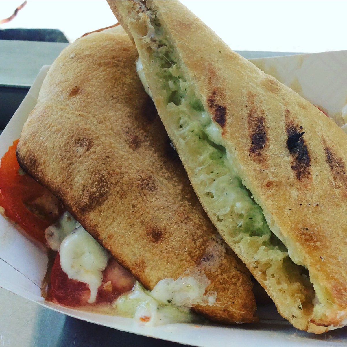 GGCTruck's tweet photo. Melted mozzarella, creamy pesto spread, and ripe tomatoes make for the perfect sandwich! Come try the Caprese today! https://t.co/p0DbeDs9WG