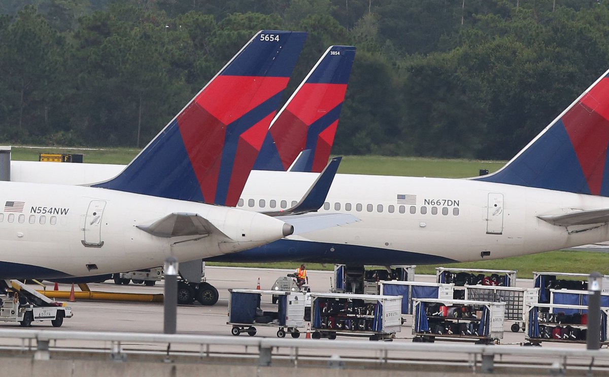 orlandosentinel's tweet photo. Delta outage continues to ground flights at Orlando International https://t.co/sMoA1slkZw https://t.co/AMPDO8vRkY