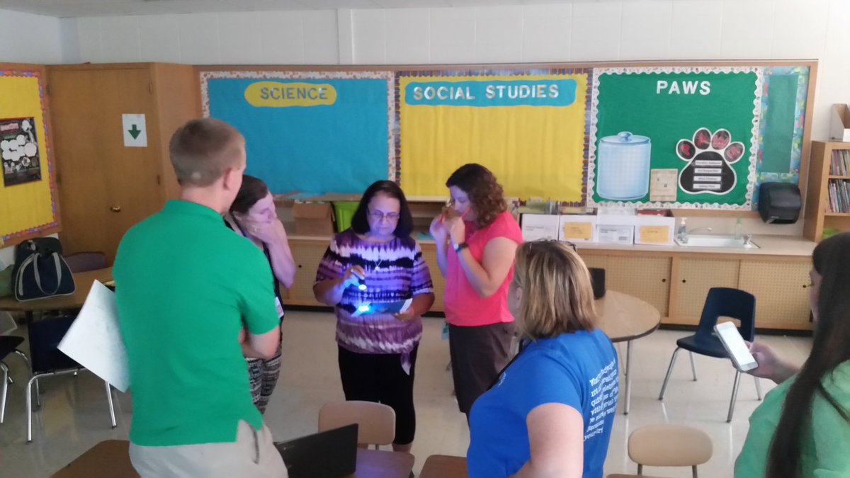 jonathanspike's tweet photo. Some @greenbayschools teachers trying to save the world in #BreakoutEDU - will they make it out in time?! #SLA16 https://t.co/i6GNDgSvKD
