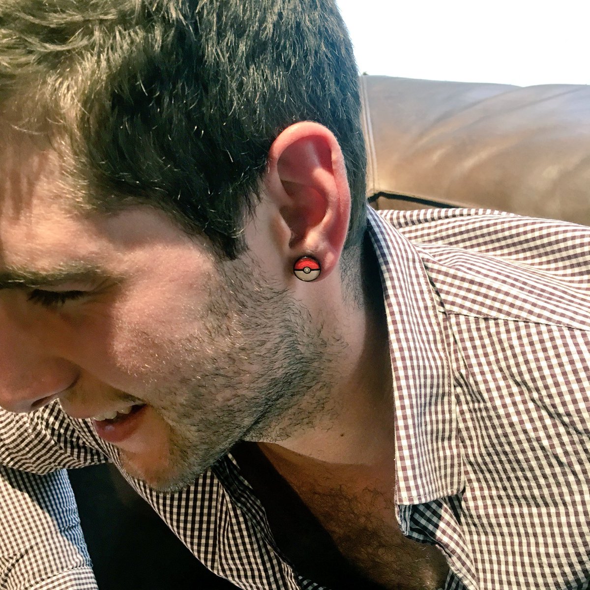 imy's tweet image. OH MY GOD @ColinOffler HAS A POKÉBALL EARRING