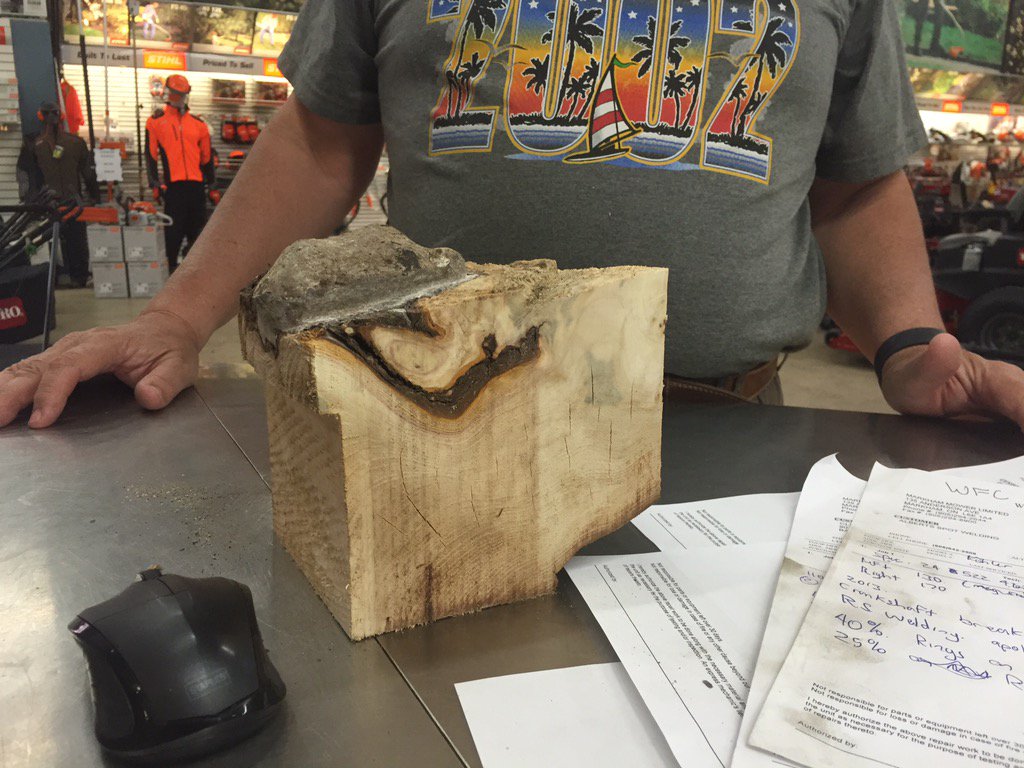 markhammower's tweet image. Customer brought this into show us. Found a rock grown into the crotch of a tree @STIHLCanada #sparkswereflyin