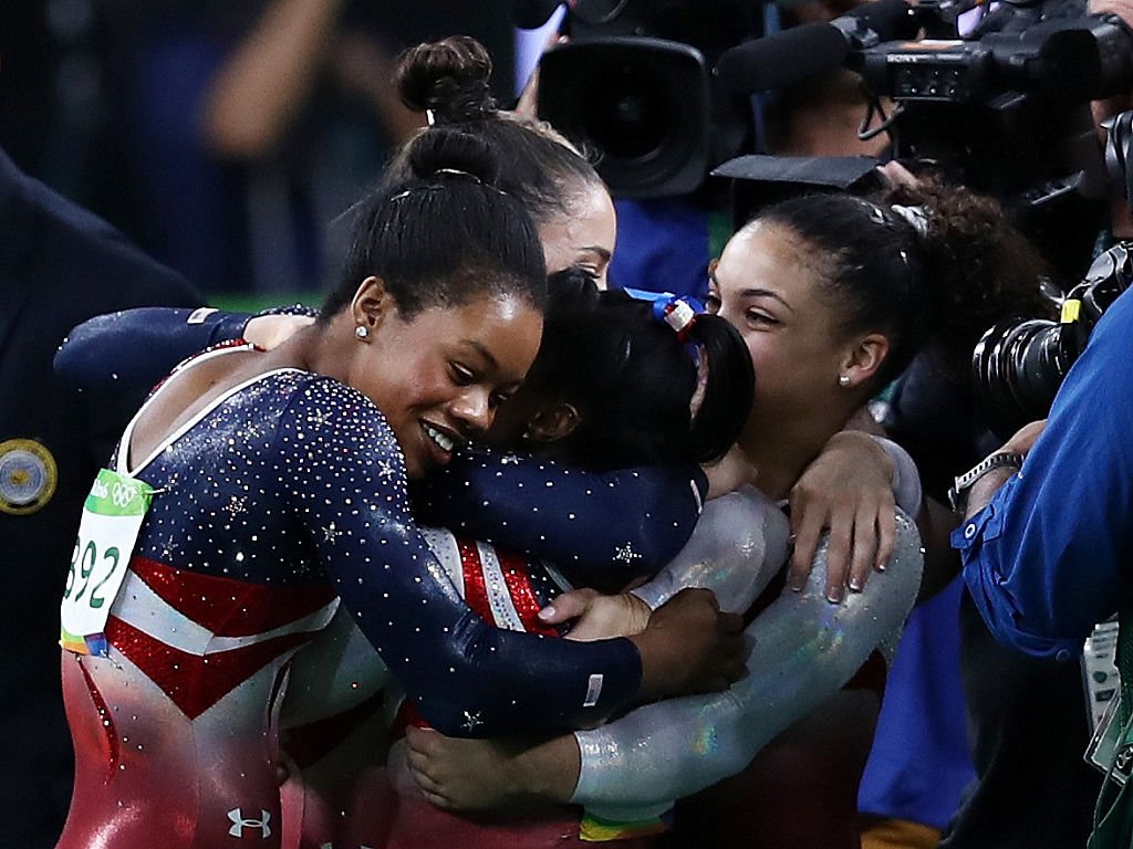 BuzzFeed's tweet photo. US women's gymnastics team celebrates winning gold #Rio2016 🇺🇸🇺🇸🇺🇸 https://t.co/ZRzQprZKl7 https://t.co/WXBTU3HZWk