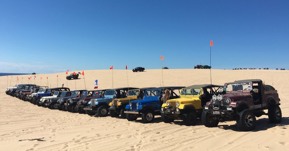 JPFreek's tweet image. A pack of #Jeep Scramblers #CJ8 on the sand ☀️😎