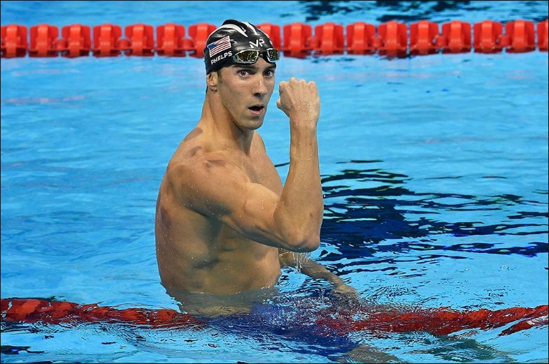 Guatevision_tv's tweet photo. Phelps hace historia y gana su medalla de Oro No.20 en los 200m  mariposa f. @latimes https://t.co/VwFXt0cyDs