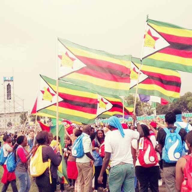 MagisZimbabwe's tweet photo. Raising our country flag in a positive manner of course. Reliving the World Youth Day moments. #Krakow2016 #beMAGIS https://t.co/git34lI9tv