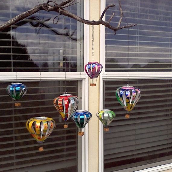 We love these recycled aluminum can hot air balloon decorations by J n G Designs and Treats 🌳 #upcycled #recycle
