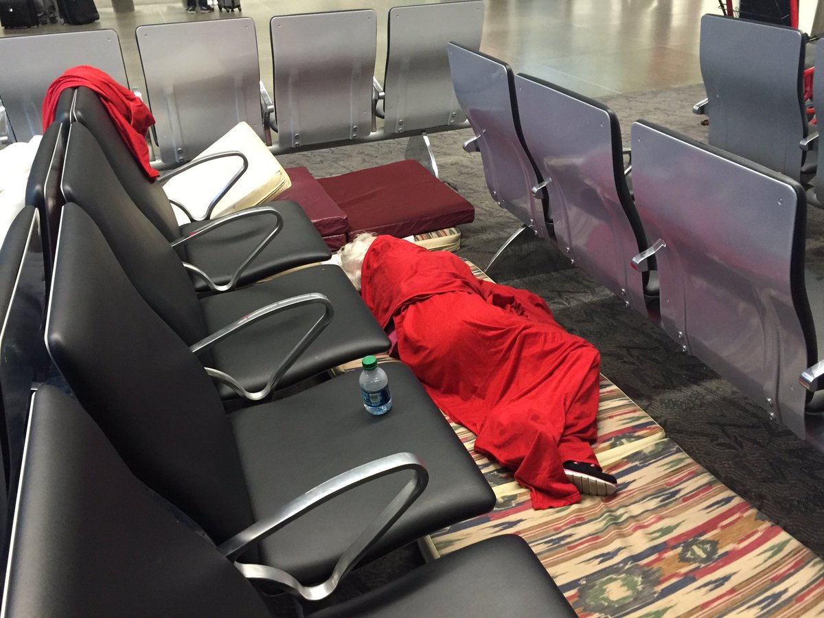IvoryHecker's tweet photo. 92-year-old and 73-year-old sleeping on floor at MSP this morning. They say #Delta told them there were no hotels. https://t.co/yEGOQ6uS6w