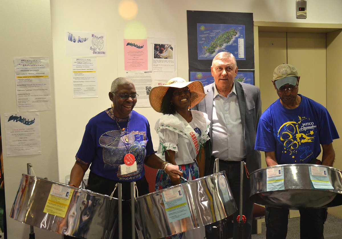 JimJimmaloway's tweet photo. Caribbean pavilion w/ Wpg Steel Orchestra, Agnes, Ruthven, Scott, &amp; ambassador Rychelle #woventogether #folklorama47 https://t.co/TZVoxkJk4W