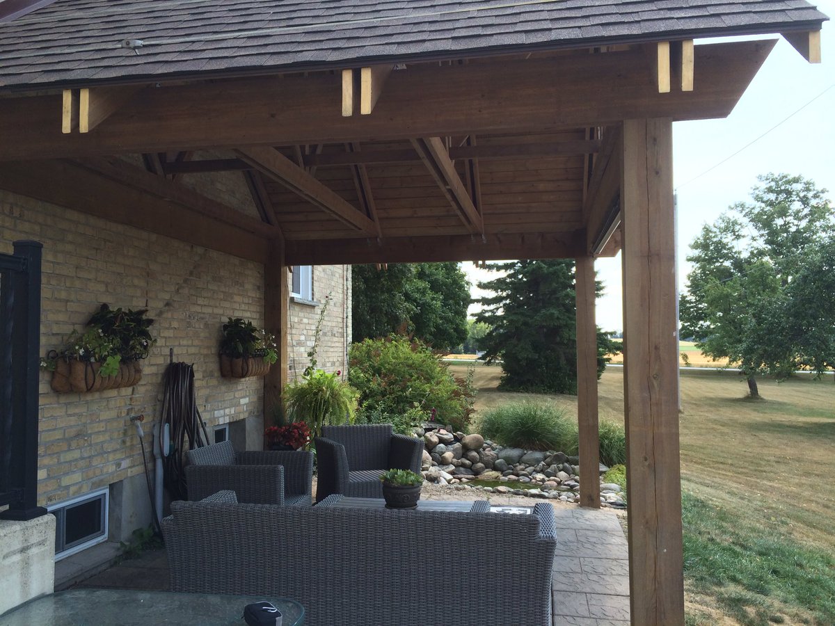 Covered patio. 12x16. Treated Seinna lumber. Custom fabricated trusses.Exterior Sunshade with Valance.
