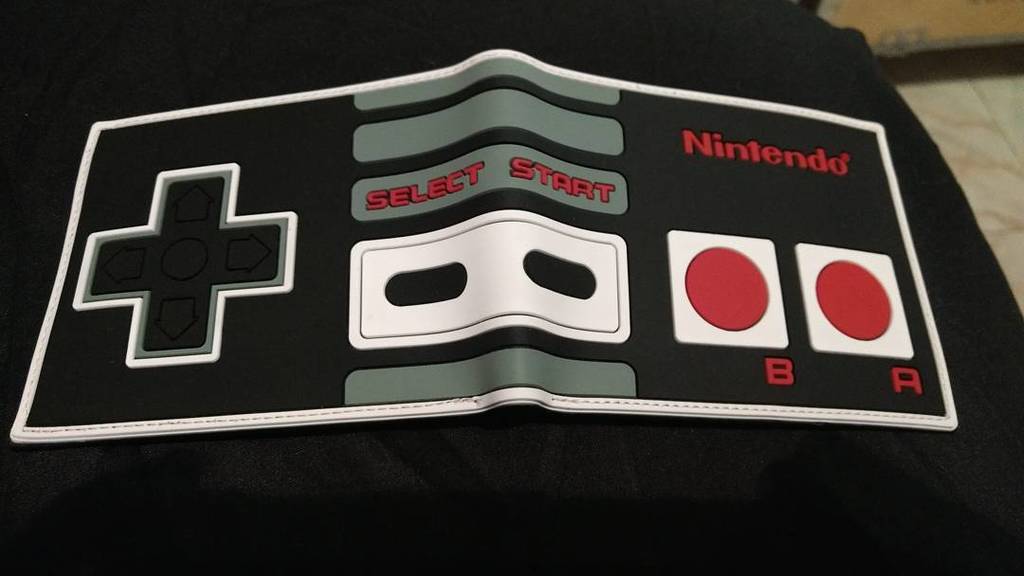 EGROJtheOGRE's tweet photo. I love my wallet even if it is empty #lol #nintendo #nescontrollers https://t.co/BO7OSwca0S