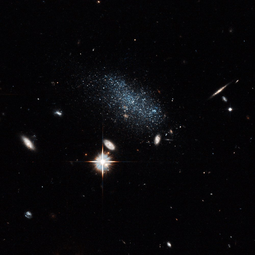NASAHubble's tweet photo. Pisces A &amp; B were once in a region of space that had no star forming gas. But not anymore!

https://t.co/wgSRMPyBgJ https://t.co/2mrOV8QScK