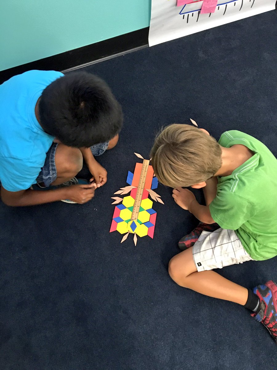 AMAElementary's tweet photo. Our shape butterflies have perfect symmetry! #AMAelementary #handsonlearning https://t.co/8LJFlTB7H6