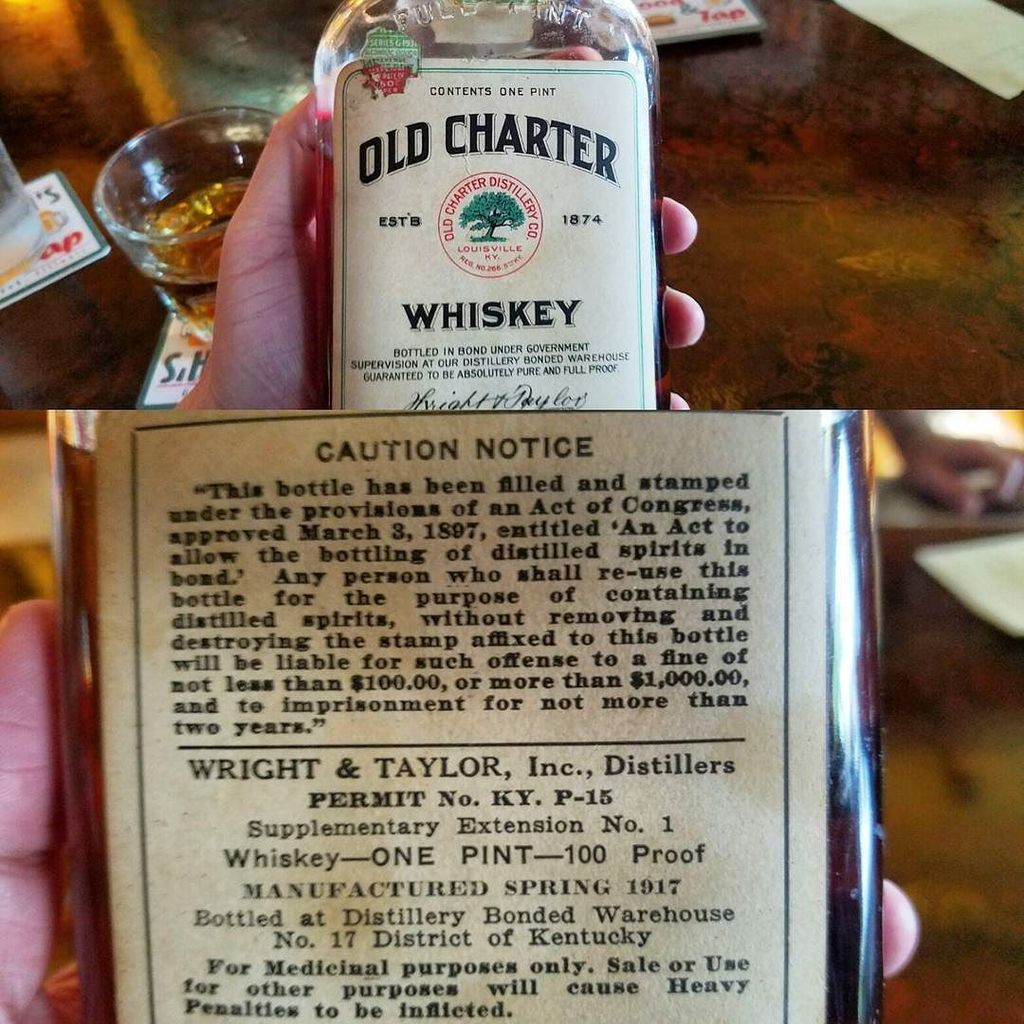 chicagobourbon1's tweet photo. A very old bottle of Old Charter Whiskey. Bottled in Bond. 1917.

#bottledinbond #oldchart… https://t.co/epurSbX6Pb https://t.co/b8KzADfEzJ