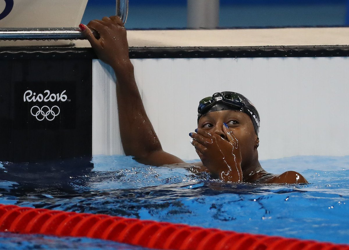 PlayersTribune's tweet photo. That feeling when you realize you're the first African-American female swimmer to win an individual #gold https://t.co/P60j9YuqTO