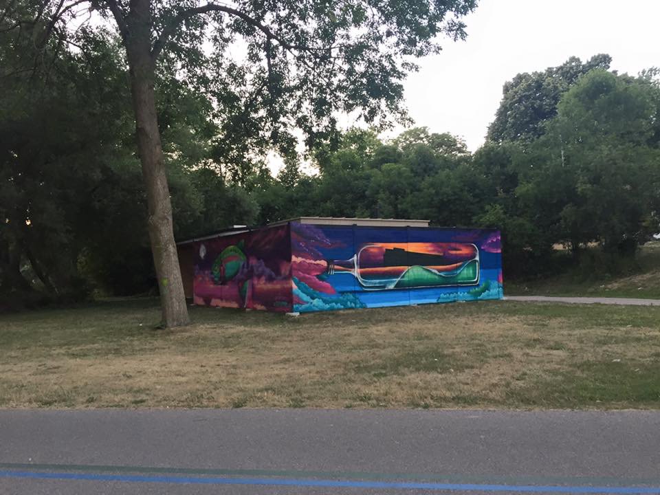 StART_Toronto's tweet photo. Another mural done! Moises Frank (#luvsumone) has remade this building in Marie Curtis Park @LakeshoreArts @TPS22Div https://t.co/DijigFXrcS