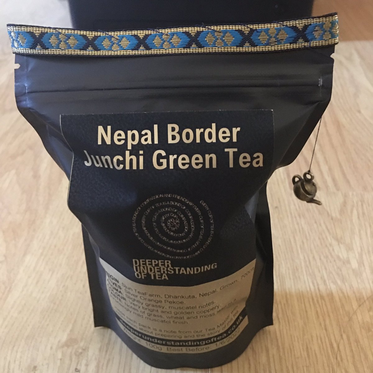 Still loving the #nepal #greentea from <a href="/DeeperTea/">DeeperTea</a>  here's a packet about to be opened!  (Rocking the #teapot charms)