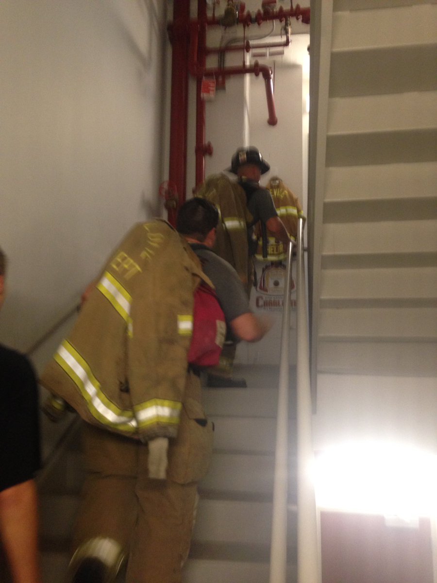 BPSuthard's tweet photo. Linay Sheltra is on the 73rd floor, cheering & hugging climbers as they pass! #PVFD73 #CLT911StairClimb #SAFRE2016 https://t.co/Hhh3mAhdxg