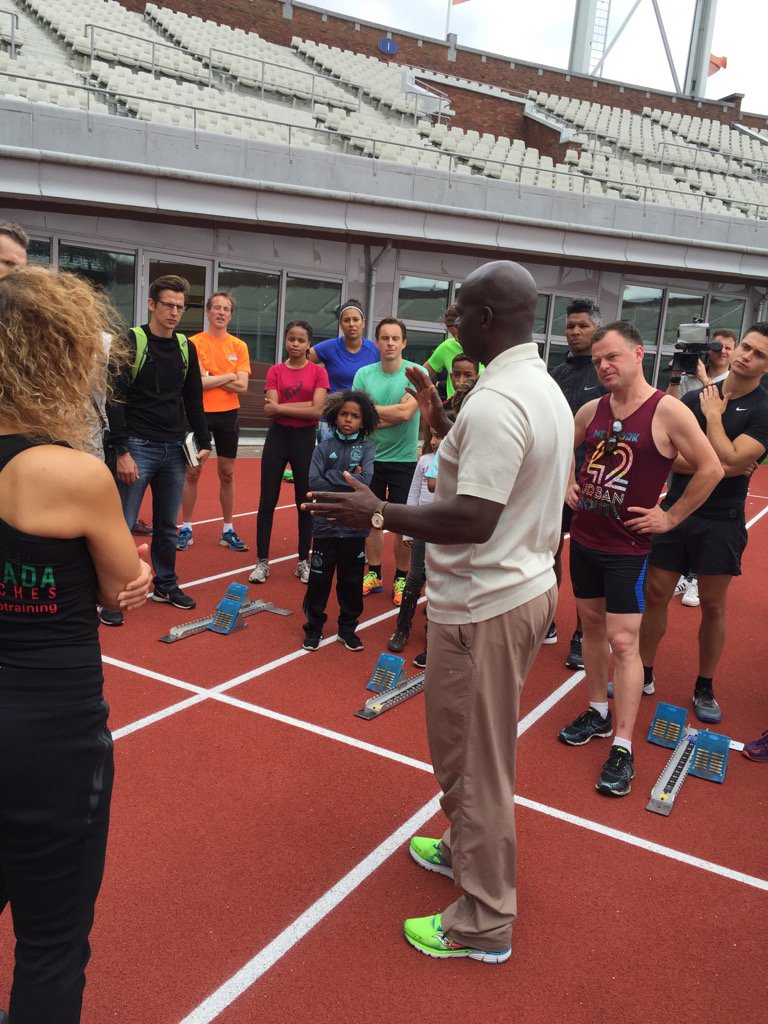 Teaching how to use the starting blocks at the Olympic stadium in Amsterdam.