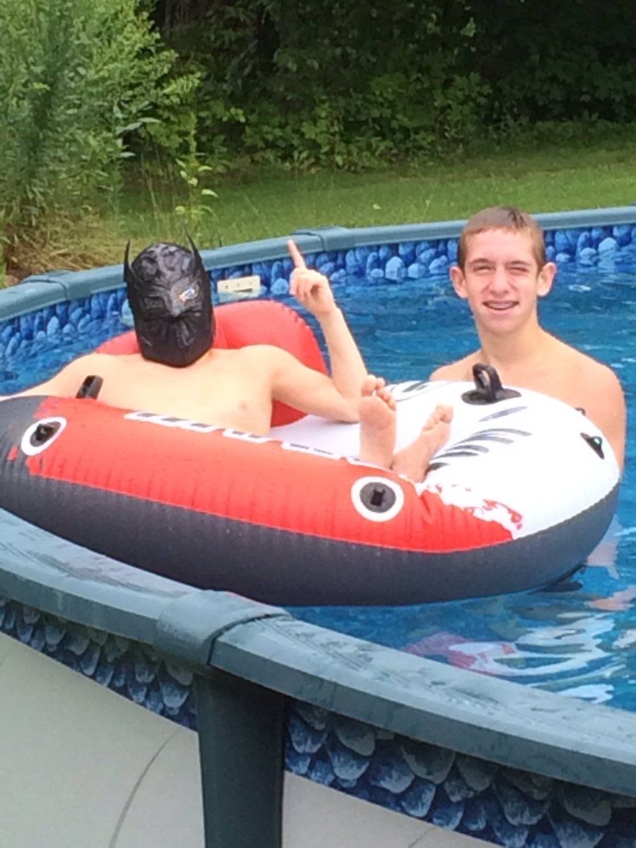 LongSaxon's tweet photo. My friend #TylerChapman and I having fun here at his house in the pool!!! #LuchaFun #LuchaSummer #Summertime https://t.co/27Je5g0Vd3