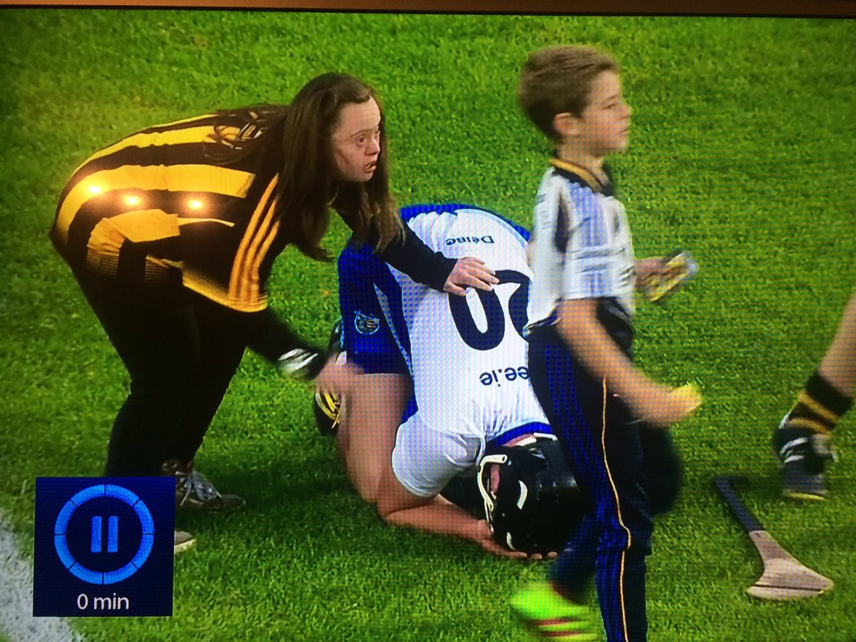 IndoSport's tweet photo. This Kilkenny fan consoling a defeated Waterford player could well be the photo of the year https://t.co/cQGUK6Xc8j https://t.co/x9PKw1lyj7