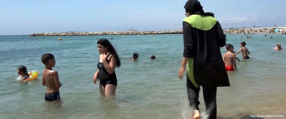 ABC's tweet photo. Cannes bans "burkini" swimsuit from beaches; mayor calls it "uniform of extremist Islamism" https://t.co/gI1h1IC311 https://t.co/kS519joYIv