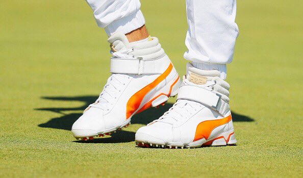 darrenrovell's tweet photo. Not sure what I like more: @RickieFowler's hi tops or his mustache https://t.co/Ehzs6aX25z