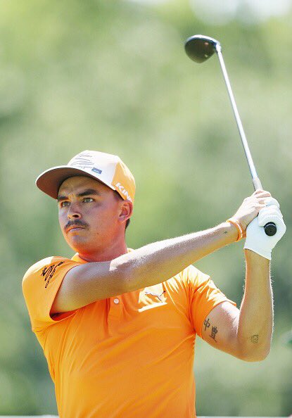 darrenrovell's tweet photo. Not sure what I like more: @RickieFowler's hi tops or his mustache https://t.co/Ehzs6aX25z