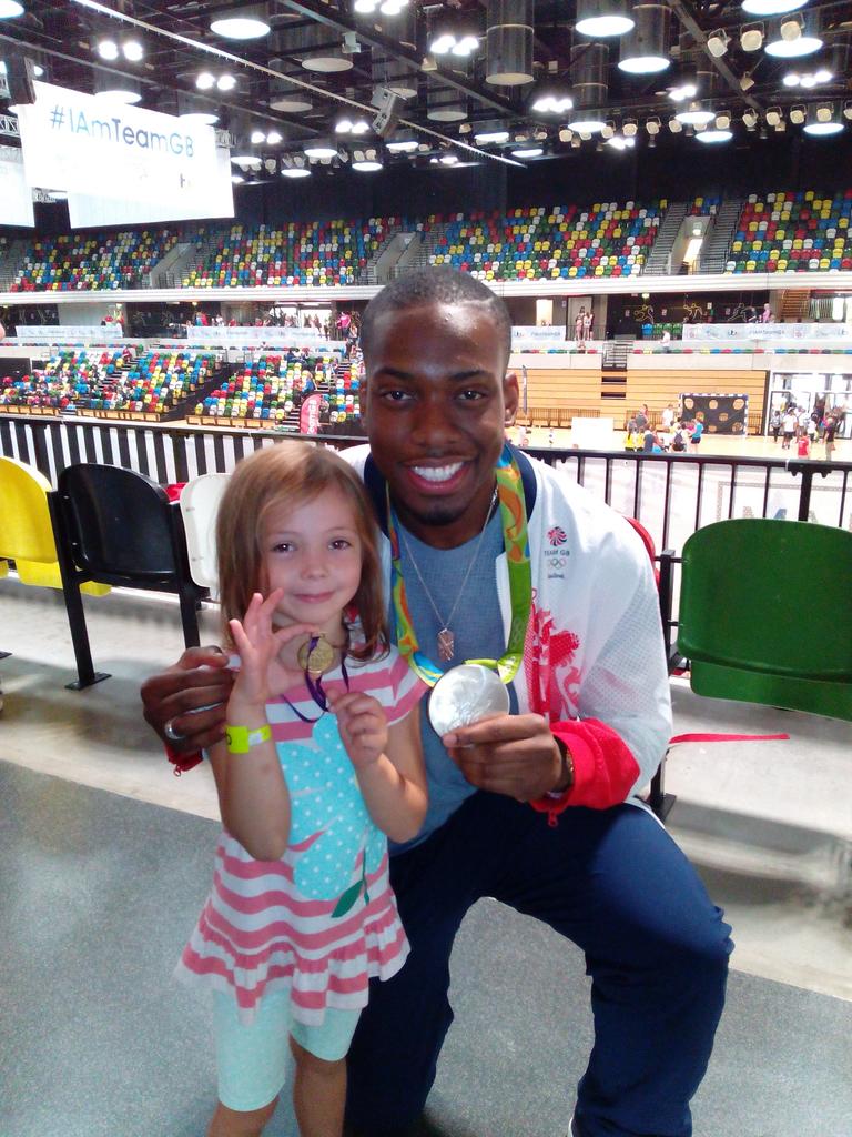 paulihicks's tweet photo. #IAmTeamGB silver medalist having a joke with my little girl, asked to swap medals,she said no! https://t.co/fKKOCZePgz