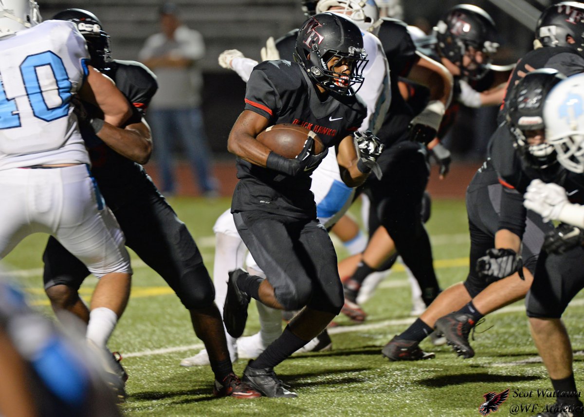 #5 Josh Alexander spiting the defenses. 

<a href="/WFFootballTeam/">WF Football Boosters</a> <a href="/WFHSBigRedRage/">BIG RED RAGE</a>