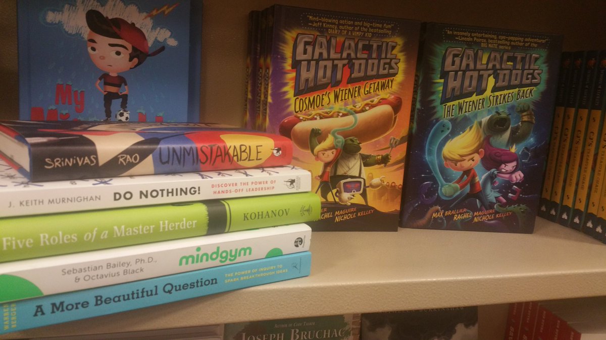 robynbergeron's tweet photo. tfw your book basket has "5 roles of a master herder" *AND* THE first book in the "galactic hot dogs" kids' series https://t.co/uc3nTMualK