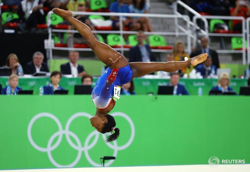 Reuters's tweet photo. Biles wins record-equaling fourth gold with floor victory at #Rio2016 https://t.co/x4VHp0Qh8h https://t.co/6bStszMfbL