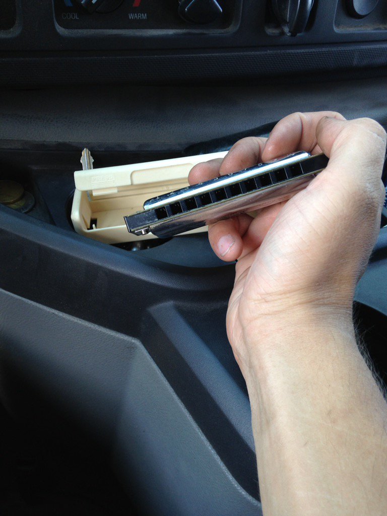 NixonSweep's tweet photo. Playing some harmonica in between calls. Don't worry, people with ears; my windows are up! #ygk #NIXSWEEP https://t.co/4eTdKjHq02