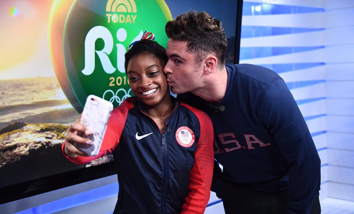 espnW's tweet photo. Win 4th gold medal ✔️

Meet celebrity crush (@ZacEfron) ✔️

Yeah, Simone had a good day. https://t.co/JH4iQVZeZi https://t.co/7stH3wJgXl