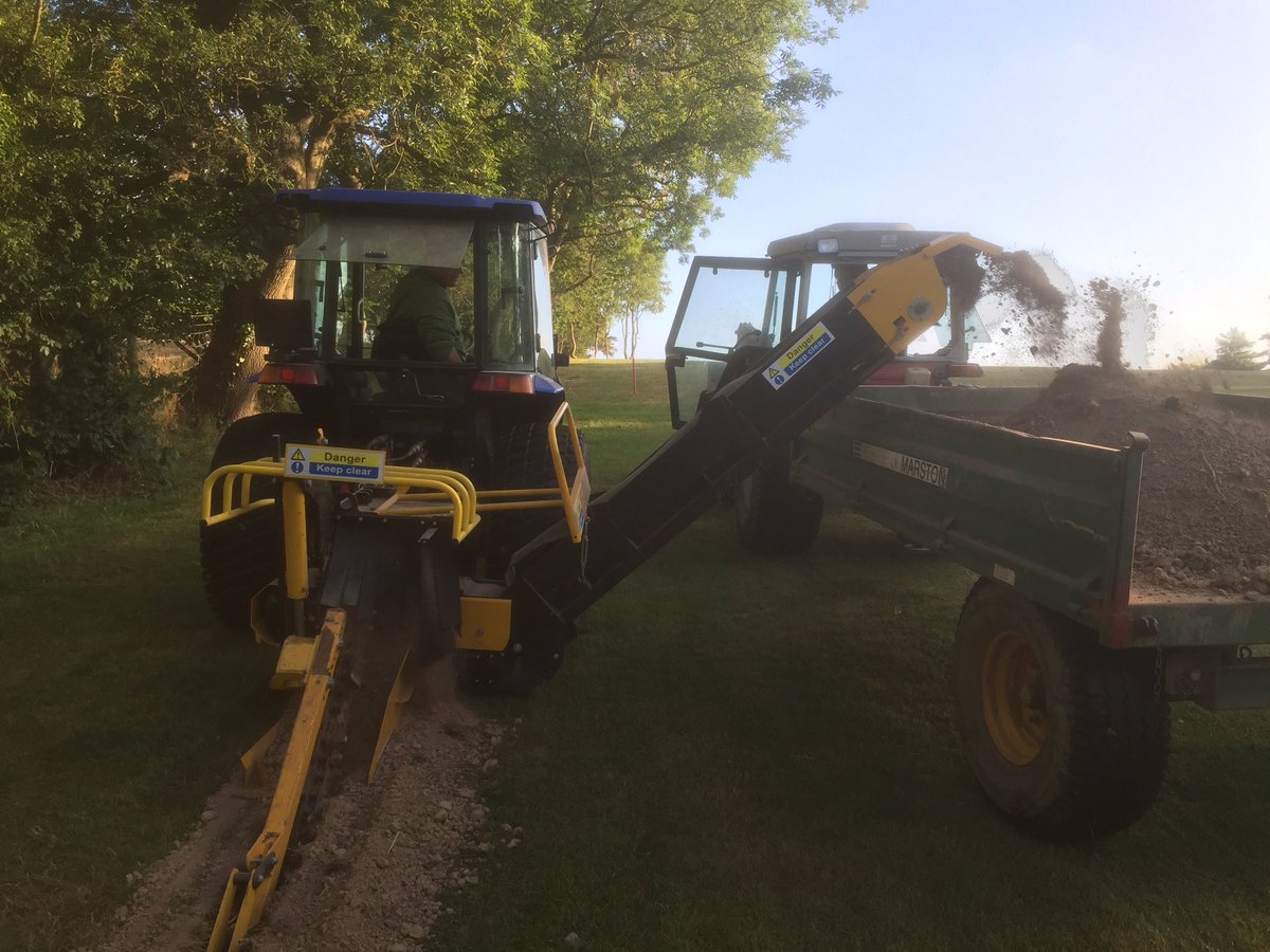 Doing some drainage work along the left side of the 4th fairway.