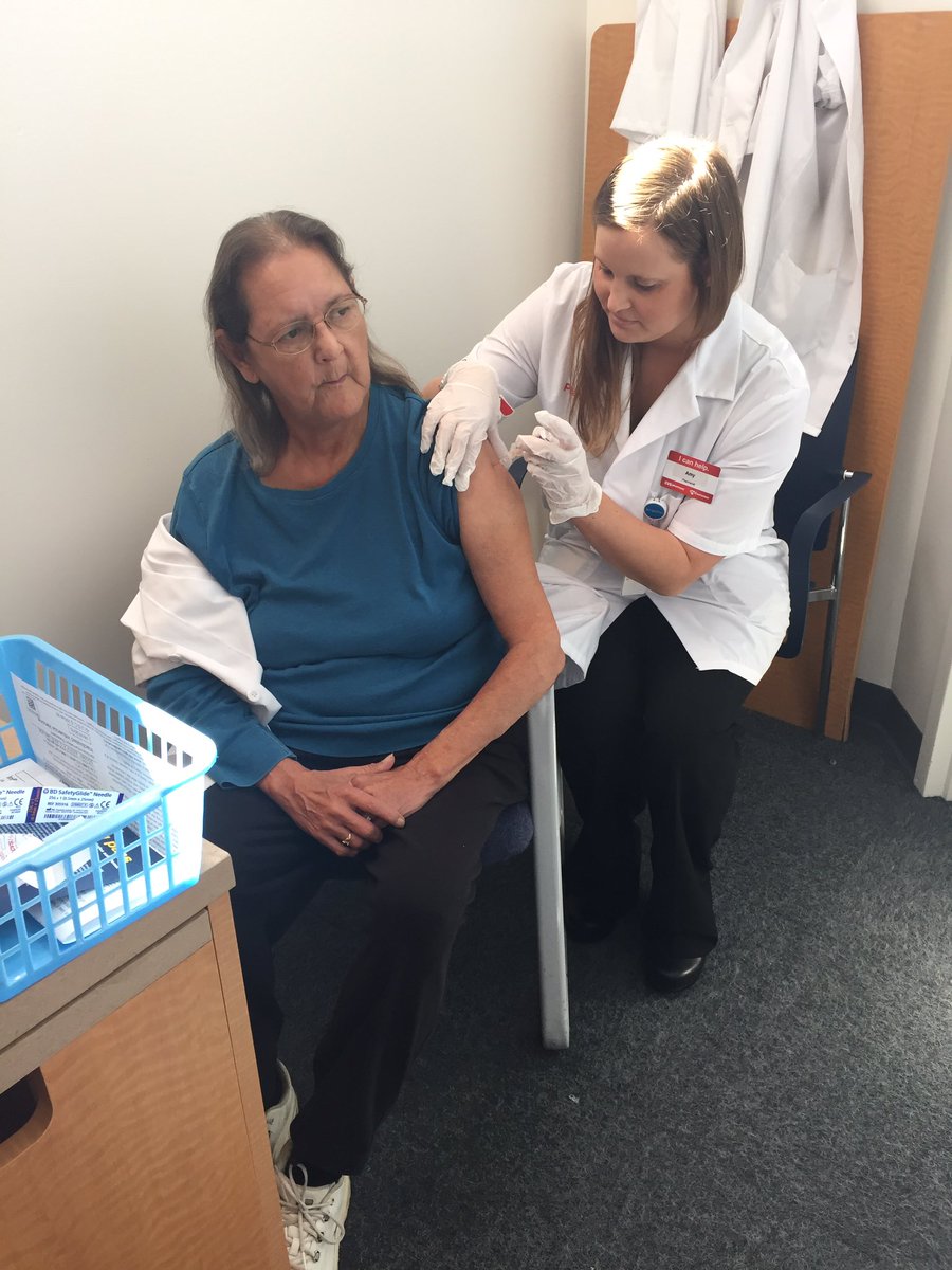 Technician Phyllis getting her flu shot at 8088 in Ann Arbor. #pride9