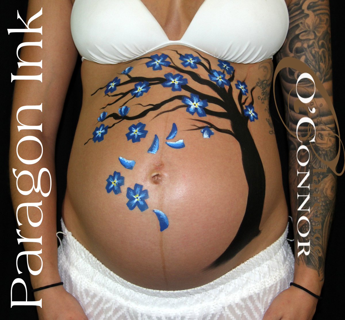 paragonink's tweet photo. Beautiful belly painting for a photo shoot #paragon #paragonink #paint #art #artist #mother #pregnancy #tree #beauty https://t.co/uXuDBLbwZY