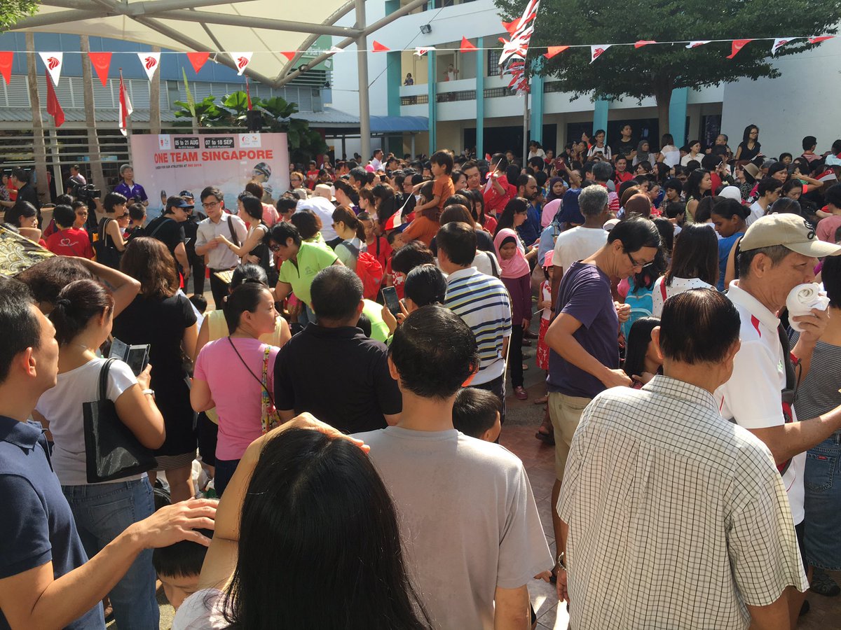 AlvinChongCNA's tweet photo. Delay for #Schooling? Sun's strong at Marine Terrace but the crowd isn't giving up https://t.co/iiAD2YRogJ https://t.co/ssB1K9budO