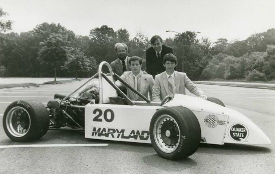 ClarkSchool's tweet photo. Two @umdme professors and students posing with their award-winning SAE Formula Design race car #TBT @UMDArchives https://t.co/oAlb6kx36e