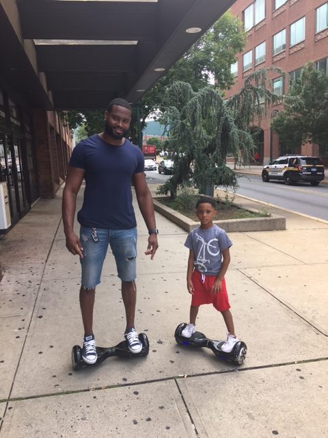 BCACTPRO's tweet image. We caught "Pook" from Brotherly Love Cuts on 4th and Washington streets sharing a hover board ride with his son.#PRF