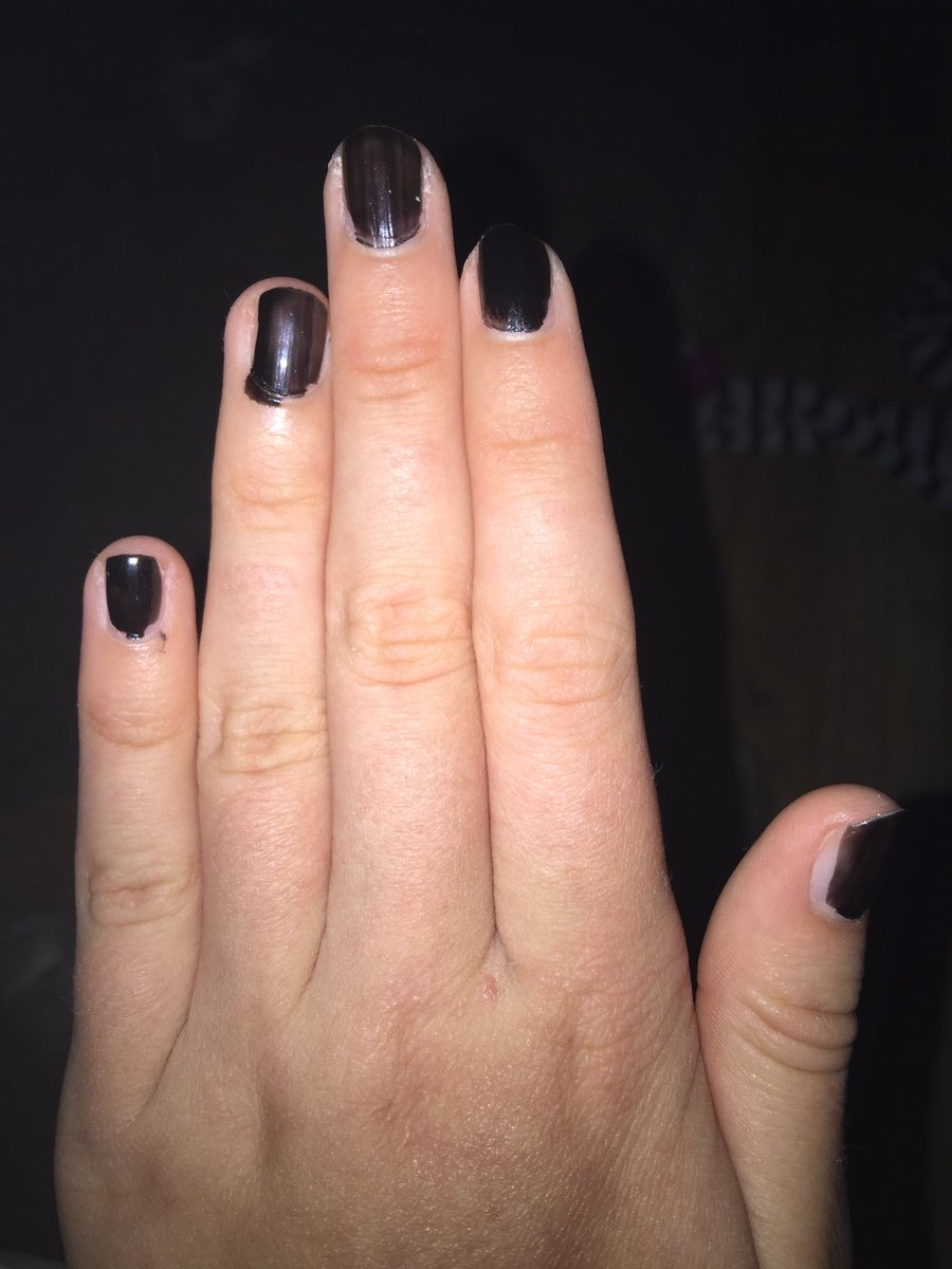Painted my nails, I kinda messed up because my dog jumped on me! >:(