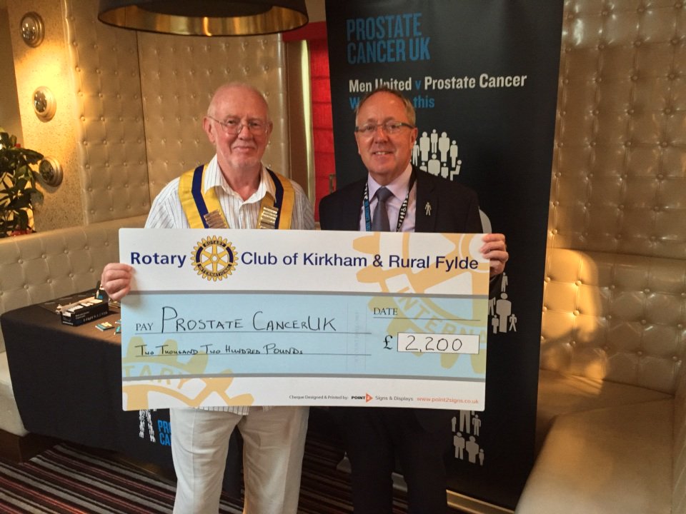 President Raymond presents cheque for £2,200 to John Heyworth of Prostate Cancer UK and thanks donors.