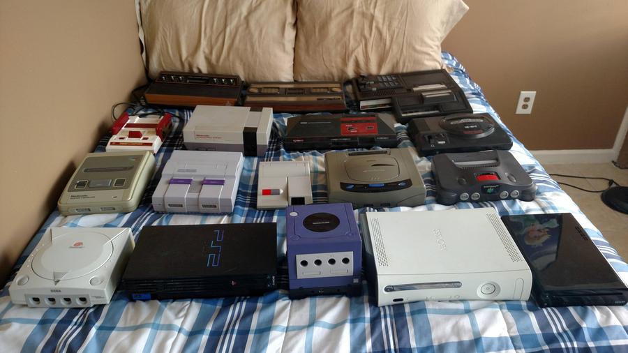I made an updated picture of the game consoles I have, organized left to right, top to bottom by year of release.