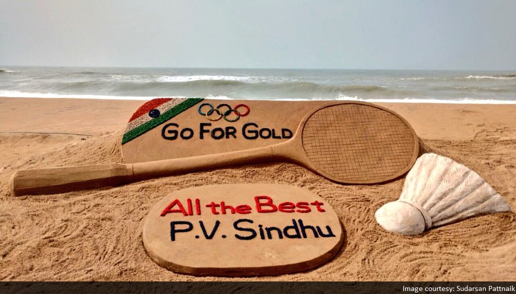TimesNow's tweet photo. IN PIC: Sand art by Sudarsan Pattnaik wishing PV Sindhu 'All the best' for today's finals at #Rio2016 #SindhuForGold https://t.co/FKKsMipFuU