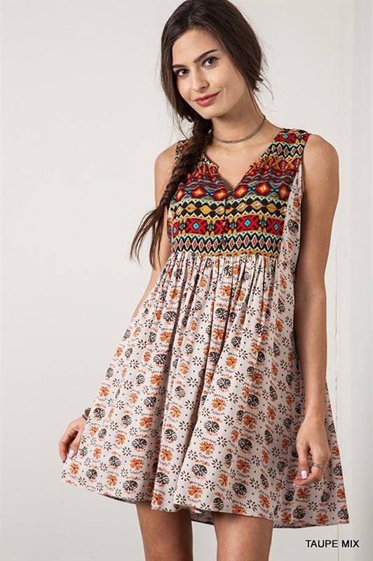 What a perfect dress to make that transition into fall!! Beautiful fall colors! 
KrumsCloset.com