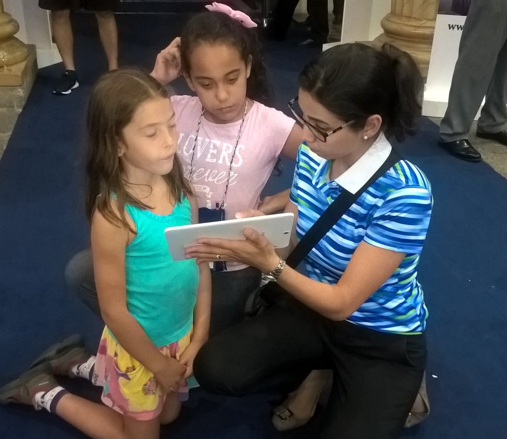 RiittaVanska's tweet photo. 10monkeys attract children. Here  Aline from Brazilian Finoro office with children @10monkeys #koulutusvienti https://t.co/BLilAo13Ni