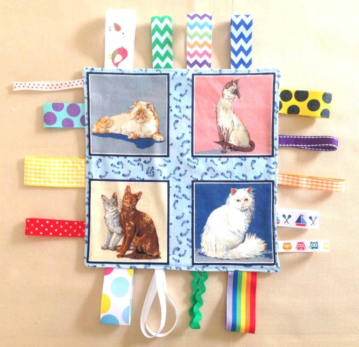 MatildasWorld15's tweet photo. Crinkle Toy, Ribbon Toy, Sensory Tag Toy, Shower Gift, Baby Giโฆ https://t.co/UeWfizFklT #matildasworld15 #TagBlanket https://t.co/vDT6zoNntQ
