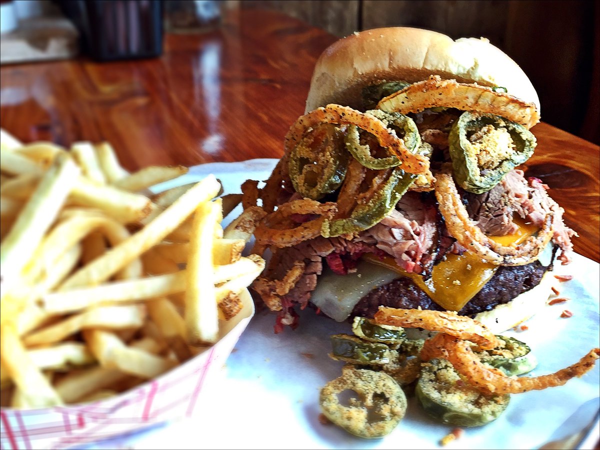 PMBBQ's tweet photo. Brisket Burger Bomb! 1/2lb burger, brisket, cheddar, pepper jack, fried jalapeños &amp; onion straws. Boom! #burger #bbq https://t.co/UoNNet9ZMA