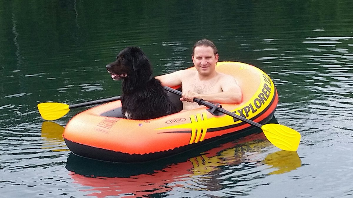 TrustOurCharlie's tweet photo. Charlie loves #summer! Here he is #rafting with his owner (and Charlie's Choice president) Josh. #adventures #pets https://t.co/7eUvGGuXex